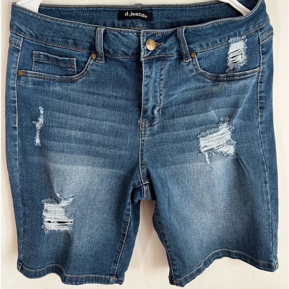 D. Jeans ripped Bermuda shorts
